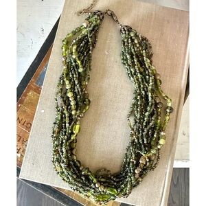 Green multi strand beaded necklace with extender